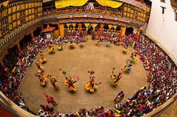 Thimphu Tshechu Festival – Monks in Traditional Cham Mask Dance Costumes at Tashichho Dzong